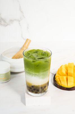 Mango Matcha Latte, organic premium-grade matcha from Tea People layered over your choice of milk and housemade mango purée.