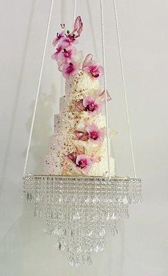 Pretty cake displayed on a chandelier