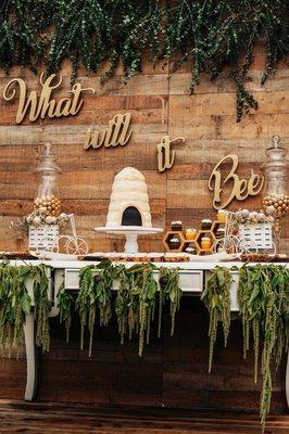 Rustic Bee Themed Dessert Table Set Up with Custom Cake Pops, Cup Cakes, Oreo Cookies, and Custom pretzel Rods