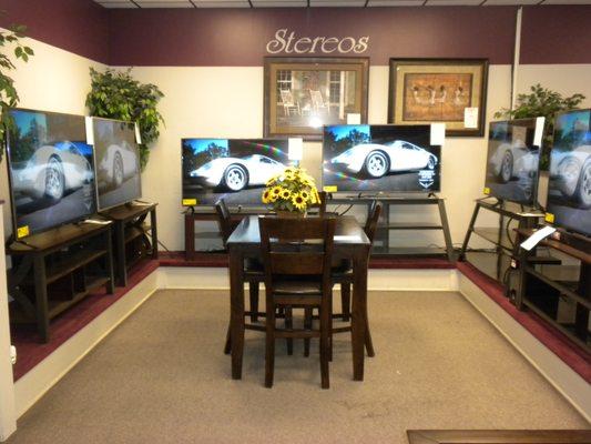 Large selection of wide screen TV's and TV stands