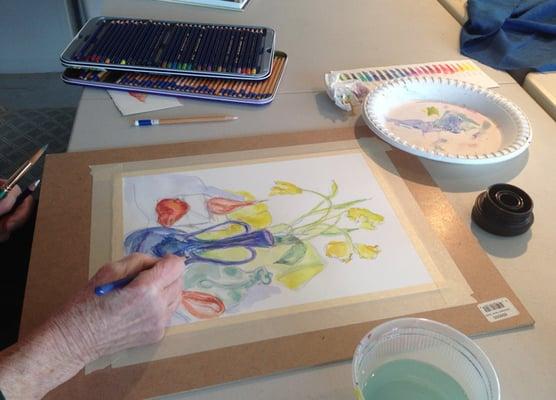 student working with watercolor pencils during an Art Boot Camp class