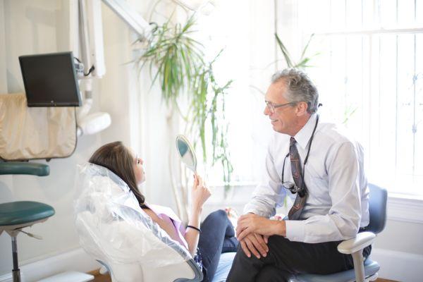 Dr. Larry Bowers in our beautiful, sun-filled operatory.