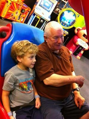 Riding the video roller coaster in the lil kids' area