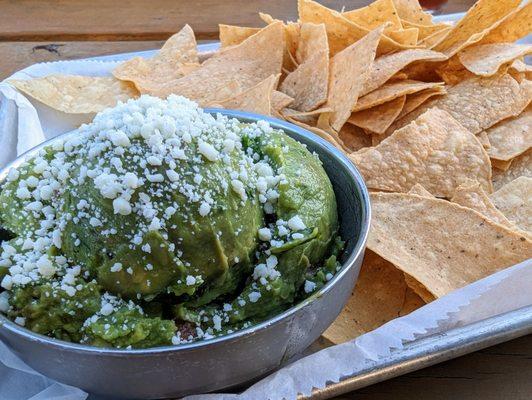 Guacamole: Made in house, garnished with cotija cheese. Served with tortilla chips