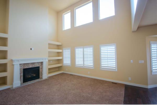 Living room window shutters.