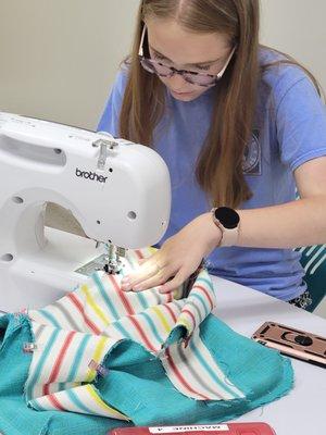 We teach sewing to people ages 8+.