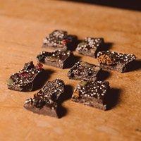 Our superfood dark chocolate bark with turmeric, seeds and berries.