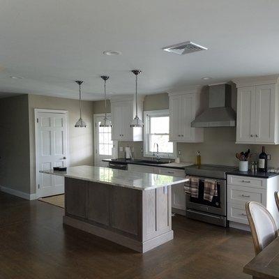 Middletown RI Garage conversion to extended kitchen and family room. Removed wall between dining room and kitchen.