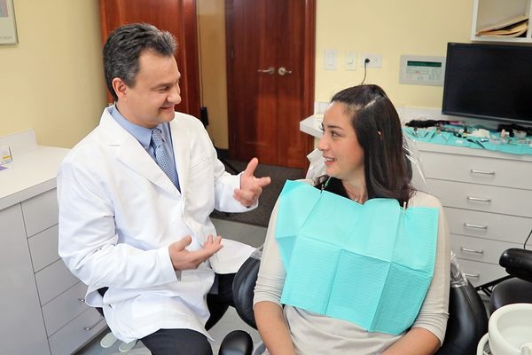 Dr. Stanescu explains treatment options with a patient.