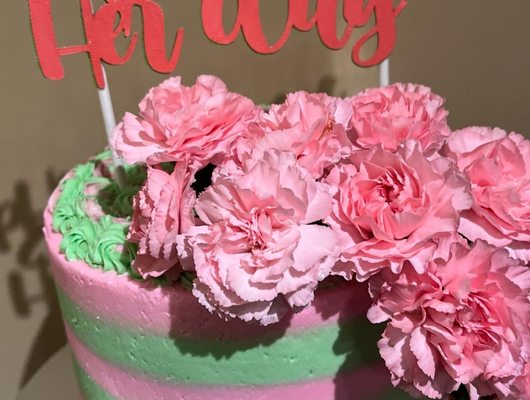 Vanilla cake buttercream frosting with raspberry filling