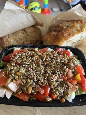 Green fusilli pasta salad with chicken. Beautiful focaccia and a salted chocolate chip cookie.