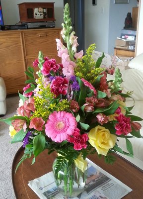 This arrangement exceeded my expectations.  FULL of flowers and beautiful!