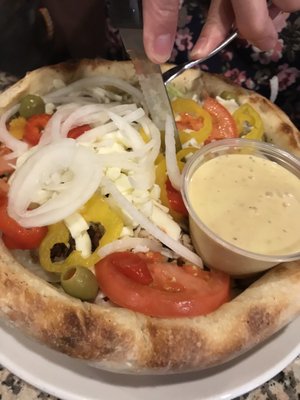 Turkey club salad in a bread bowl