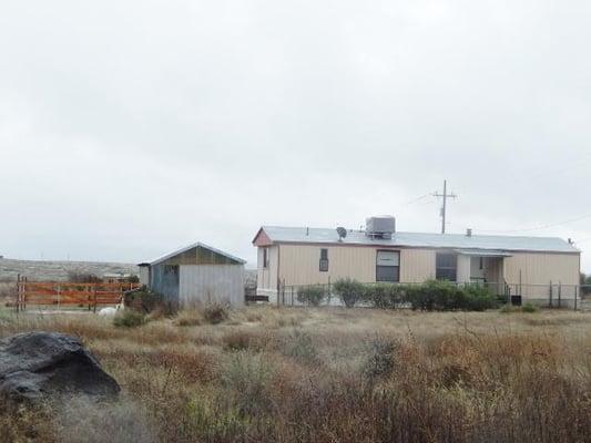 $104,500.00  1994 ON 2.5 ACRES  2 Br. 2ba. Horse Corral tack shed fenced yard front and back...