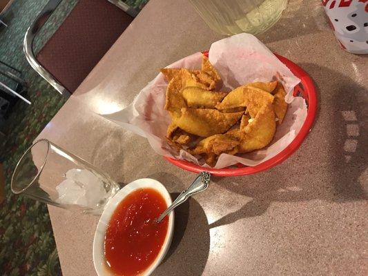 Very skinny Cream Cheese Wontons... disappointing... The Sweet n Sour sauce is not great..