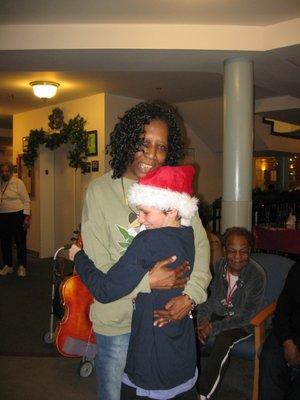 Taking requests for Christmas carols at a local retirement home.