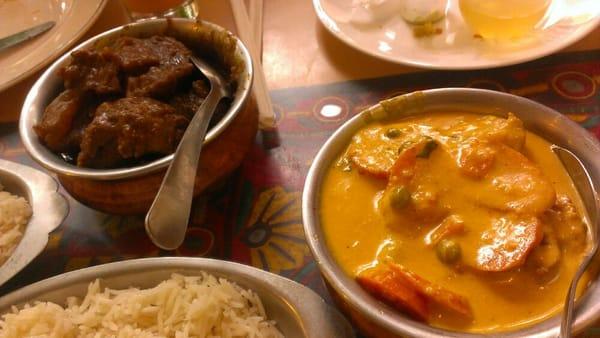 Goat curry and chicken korma (with peas and carrots added for my two year old)