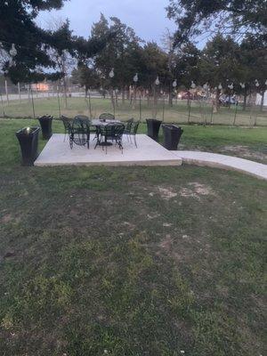 Concrete patio with drive way for residential home.