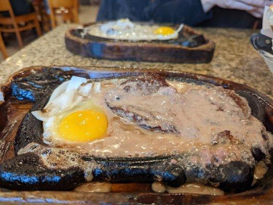 I had the sizzling beef with pate sauce and fiance had the sizzling beef with garlic butter sauce