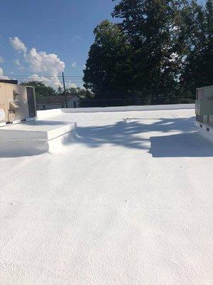 This is a Completed Spray Polyeurethane Foam system.  We cleaned this rubber roof, and was able to apply our system directly over top!