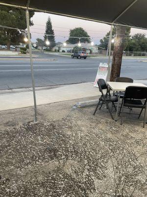 Dining area outside. Theres more tables and chairs