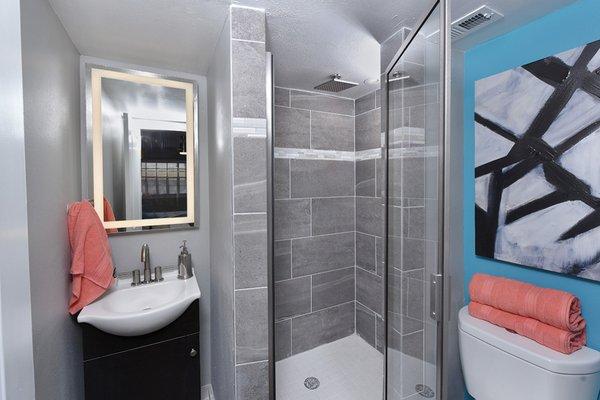 Tiled Showers and Bathroom at Watermarc Apartments