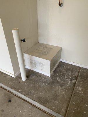 Hot water heater pedestal repair from water damage rebuilt