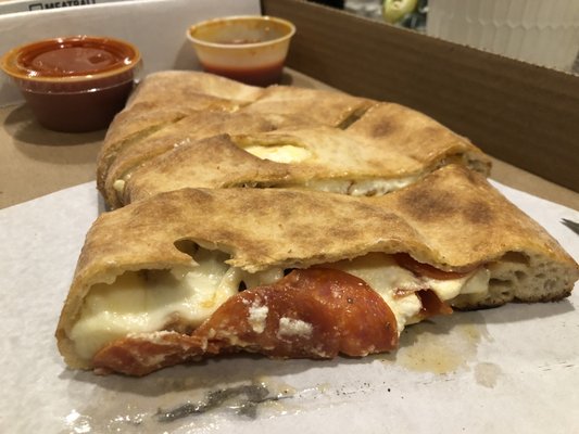 Large Mia's Stromboli - Sausage, meatballs, peppers & onions ($16.95)