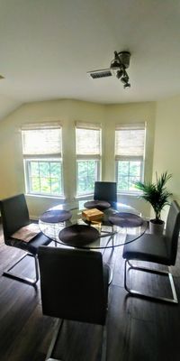 This condo was decorated with vinyl plank flooring, painting, and window treatments to complete the design