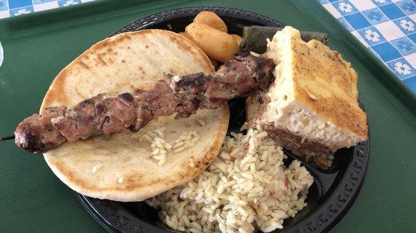 Pork souvlaki, rice, dolmathes (grape leaves), pita, roasted potatoes, and pastitsio (lasagne). Very good!