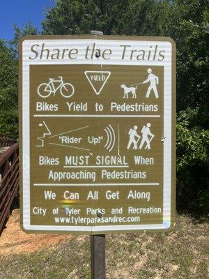 Share the Trails sign on the Rose Rudman trail