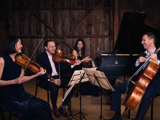 The Garth Newel Piano Quartet onstage. They are great at connecting with the audience, and join in the post-concert meals.