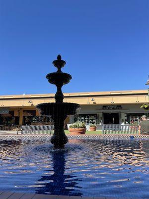 Water fountain and benches to relax