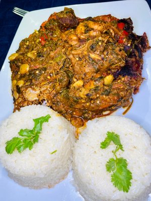 Legume is a Caribbean mixture of eggplant, cabbage, chayote, spinach, watercress carrots, meat, and seafood served with white rice.