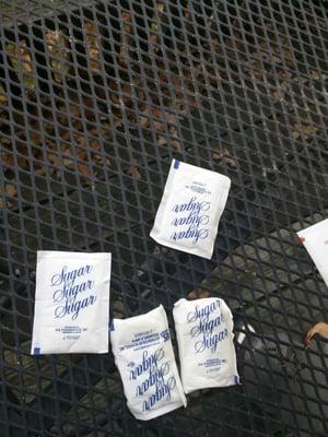 Sugar packets probably from 1972 ...looks like they got wet or have gone bad