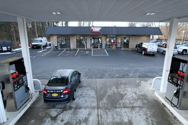 This is a drone taken image of the shop entrance from under the gas pumps.