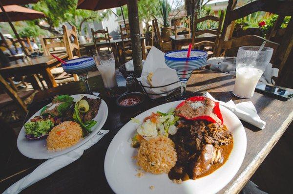 Pollo con mole y carne asada arracherra. My plate and babes plate.