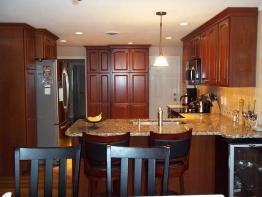 Beautiful cherry kitchen with granite, new lighting, new appliances and more...