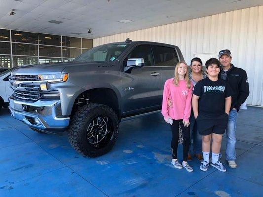 Another happy family in their New Lifted Truck!