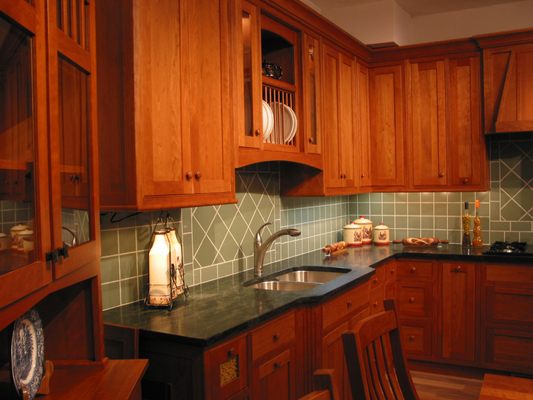 Kitchen with cherry cabinets & green tile. Countryside Cabinets from Ghent, NY