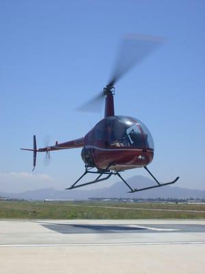 First solo flight in the R-22 on the pad at Camarillo.