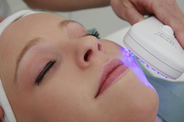 Anti-aging facials using infrared light therapy.