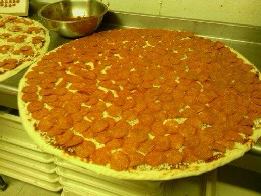 Big Ones - A great economical way to feed and WOW a huge crowd.  A 30" Pizza with 52 slices.