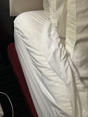 The sheet not fitting properly.