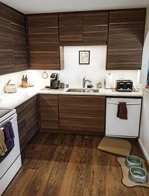 White quartz on walnut cabinets