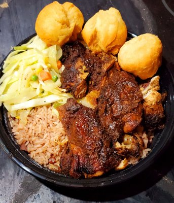 Large Jerk Chicken, with extra veg, rice & peas, and some fried dumplings. The jerk chicken here is fantastic. Nice spicy jerk sauce.