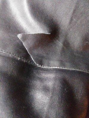 Torn sleeve on lightweight leather jacket triangular shaped 2 and 1/2 by 2 and 1/2 is it possible to get an estimate if you can repair it