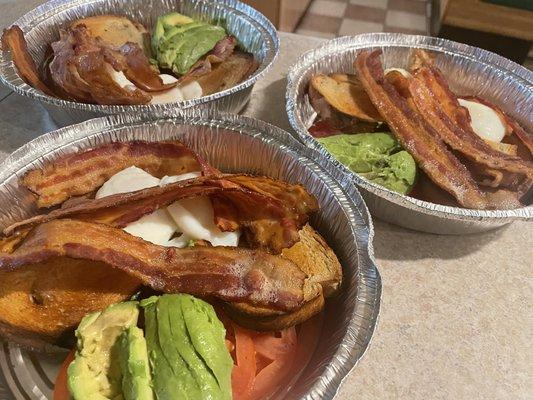 Poached egg platters with tomato/avocado