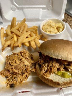 Pulled pork plate with fries and mac n cheese.