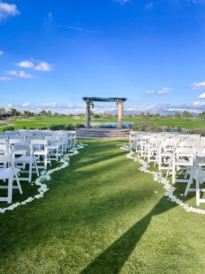 Simple and fresh white roses lined for the ceremony. Whatcha outsourced and set-up on the morning of along with setting up the venue.